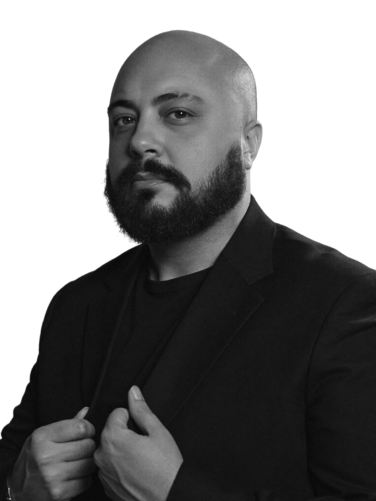 Rafael Pompeu in a black suit, black and white portrait